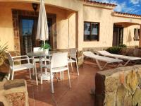 Posedenie v ubytovaní Bungalow Santa Fe bien ubicado