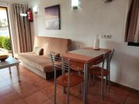 Posedenie v ubytovaní Bungalow Santa Fe bien ubicado