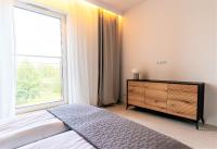 Łóżko lub łóżka w pokoju w obiekcie Bella Vista - 3pok, 5 łóżek, centrum, parking, winda, widok na rzekę, Netflix