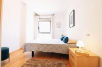 A bed or beds in a room at Espectacular vivienda con piscina climatizada