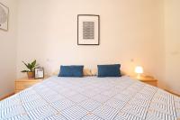 A bed or beds in a room at Espectacular vivienda con piscina climatizada