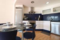 A kitchen or kitchenette at Espectacular vivienda con piscina climatizada
