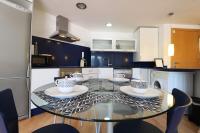 A kitchen or kitchenette at Espectacular vivienda con piscina climatizada