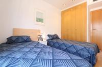 A bed or beds in a room at Espectacular vivienda con piscina climatizada