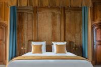 Łóżko lub łóżka w pokoju w obiekcie La Borde en Sologne Château & Spa