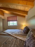 Łóżko lub łóżka w pokoju w obiekcie Alpin Resort Kaprun 14