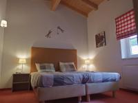 Łóżko lub łóżka w pokoju w obiekcie Alpin Resort Kaprun 14