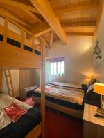 Łóżko lub łóżka w pokoju w obiekcie Alpin Resort Kaprun 14