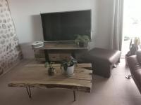 Televízia a/alebo spoločenská miestnosť v ubytovaní Domaine de Maeva