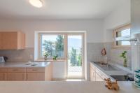 A kitchen or kitchenette at Stürz Ferienwohnungen