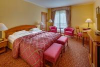 Łóżko lub łóżka w pokoju w obiekcie Hotel Savoy Prague