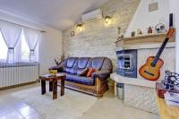 Posezení v ubytování Maslina in Popovići (Haus für 5-7 Personen)