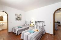Postel nebo postele na pokoji v ubytování Villa Nikki by Villa Plus