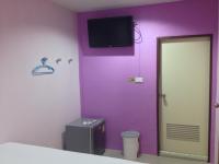 TV a/nebo společenská místnost v ubytování Krabi Orchid Hometel