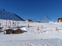 a snow covered ski slope with a ski lift at Studio Plagne Aime 2000, 1 pièce, 4 personnes - FR-1-181-2618 in Aime-La Plagne