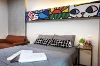 Postel nebo postele na pokoji v ubytování Be Live Residence