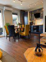 Kuchyňa alebo kuchynka v ubytovaní Luxury Maślice Apartment