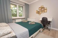 Posteľ alebo postele v izbe v ubytovaní Duży apartament w centrum przy rynku