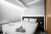 Posteľ alebo postele v izbe v ubytovaní Adelle Apartments, The Luxury Suites