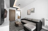 Posedenie v ubytovaní Adelle Apartments, The Luxury Suites