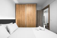 Posteľ alebo postele v izbe v ubytovaní Adelle Apartments, The Luxury Suites