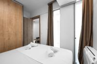 Posteľ alebo postele v izbe v ubytovaní Adelle Apartments, The Luxury Suites