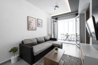 Posedenie v ubytovaní Adelle Apartments, The Luxury Suites