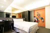 Hotels Here - Taipeiにあるベッド