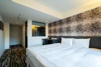 Hotels Here - Taipeiにあるベッド