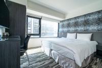 Hotels Here - Taipeiにあるベッド