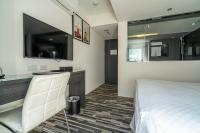 Hotels Here - Taipeiにあるテレビまたはエンターテインメントセンター