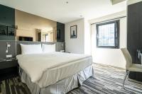 Hotels Here - Taipeiにあるベッド