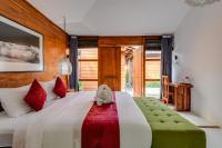 Turtle Villas, Canggu Managed by Manaraにあるベッド
