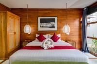 Turtle Villas, Canggu Managed by Manaraにあるベッド