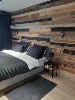 Posteľ alebo postele v izbe v ubytovaní Apartament nad Wilgą