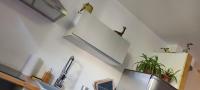 Kuchyňa alebo kuchynka v ubytovaní Appartement cosy, au calme, axe Annecy - Genève