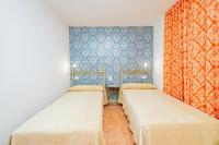 Cama o camas de una habitación en Hotel Manzanito