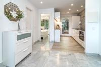 A kitchen or kitchenette at SAT2 - Modern 2 bedroom apartment with ocean view