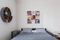 A bed or beds in a room at JOIVY Superb Flat with Home Office