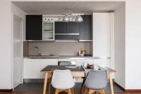A kitchen or kitchenette at JOIVY Superb Flat with Home Office