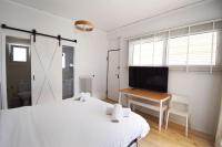Postel nebo postele na pokoji v ubytování Penthouse Nea Smirni