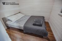 Posteľ alebo postele v izbe v ubytovaní Wisełka Park - West Pomeranian