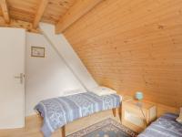 a room with two beds in a attic at Maison Luz-Saint-Sauveur, 3 pièces, 4 personnes - FR-1-402-40 in Luz-Saint-Sauveur