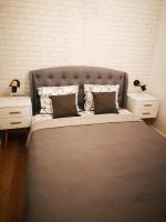 Posteľ alebo postele v izbe v ubytovaní Apartament Tarsis Superior