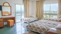 Hotel Royal Jinene Sousseにあるベッド