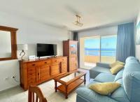 A television and/or entertainment centre at Clubrent - Apartamentos Apolo 16
