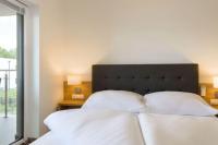 Posteľ alebo postele v izbe v ubytovaní LUXUS Appartement am Golfplatz und Therme Lutzmannsburg