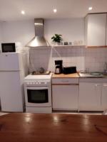 Kuchnia lub aneks kuchenny w obiekcie petite maison chaleureuse
