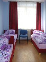 Posteľ alebo postele v izbe v ubytovaní Hostel Omega