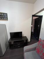 TV a/nebo společenská místnost v ubytování Porto Sharm vib suites
